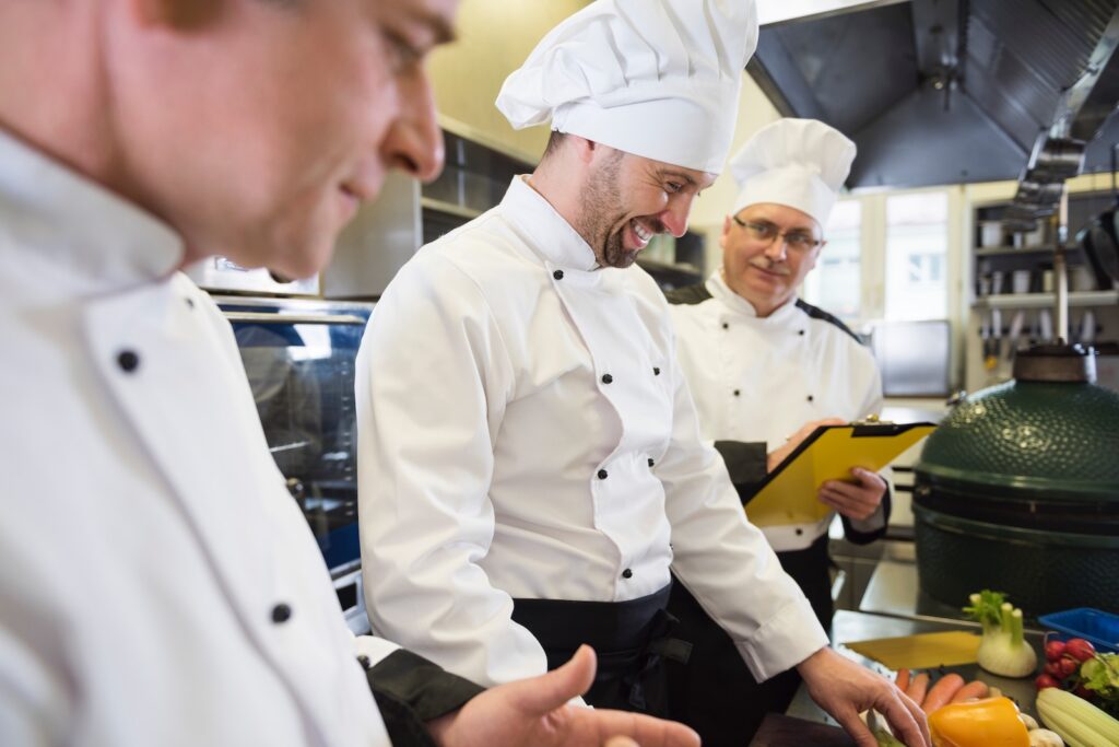 a group of chefs in a kitchen